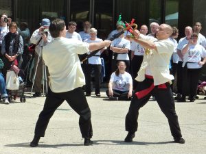 Rick and John performing Umbrella vs. Daggers kung fu form at the 2012 Festival of the Arts